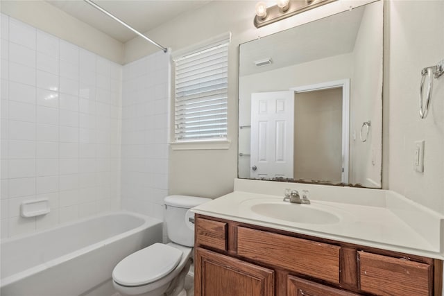 full bathroom featuring toilet, visible vents, shower / bathing tub combination, and vanity