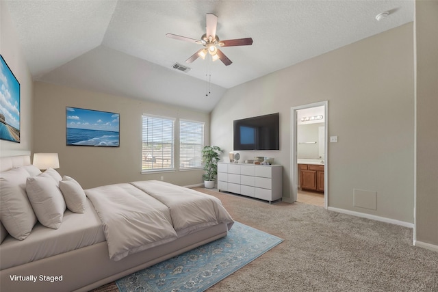 bedroom with light carpet, baseboards, visible vents, lofted ceiling, and a textured ceiling