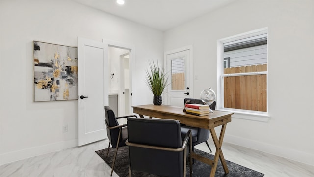 office space featuring recessed lighting, baseboards, and marble finish floor