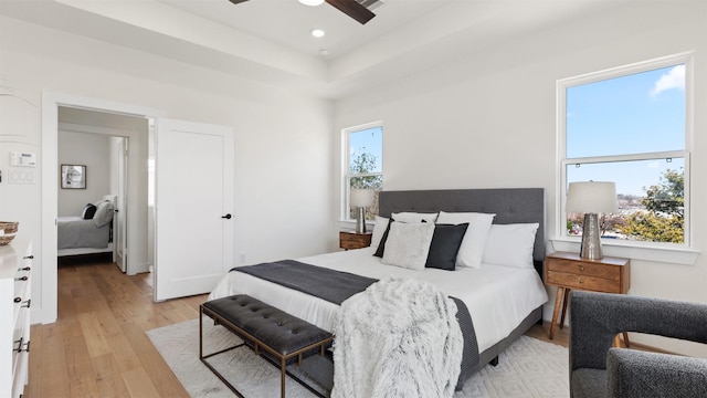 bedroom with recessed lighting, light wood-type flooring, and ceiling fan