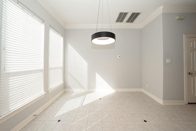 unfurnished dining area with baseboards, visible vents, ornamental molding, and light tile patterned flooring