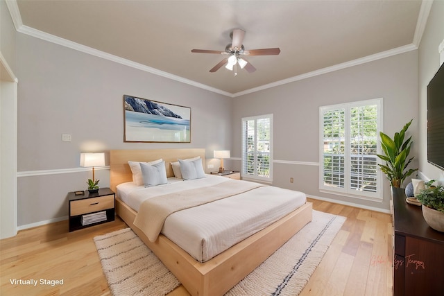 bedroom with light wood-style flooring, ornamental molding, ceiling fan, and baseboards