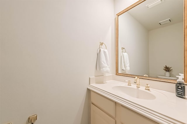 bathroom featuring visible vents and vanity