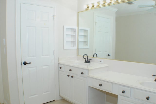 bathroom featuring visible vents, ceiling fan, and vanity