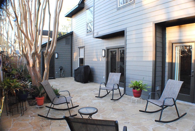 view of patio / terrace featuring grilling area and french doors