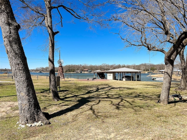 exterior space with a gazebo and a carport