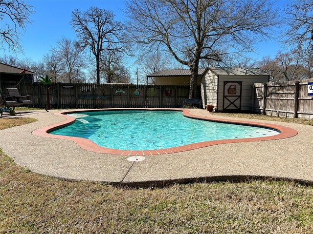 20315 Post Oak Loop, Thornton, TX 76687 - view of pool with fence, an outbuilding, a patio, a fenced in pool, and a storage unit