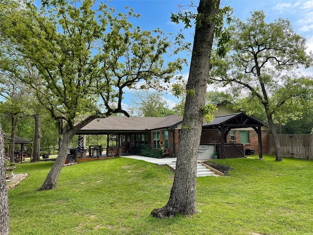 20315 Post Oak Loop, Thornton, TX 76687 - single story home featuring a gazebo, brick siding, a front lawn, and fence