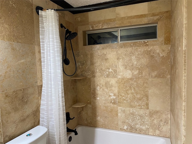 full bath with toilet and shower / tub combo