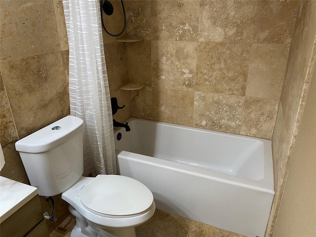 full bathroom with toilet and shower / bath combo