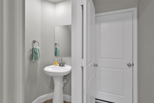 bathroom featuring baseboards