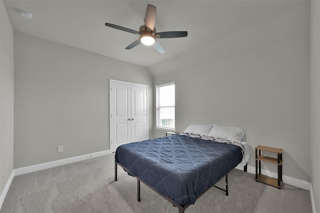 bedroom with carpet, a closet, ceiling fan, and baseboards