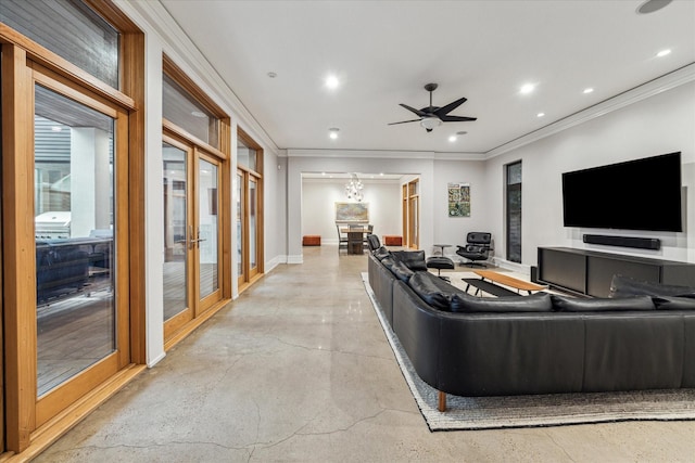 living room featuring concrete flooring, recessed lighting, baseboards, french doors, and crown molding