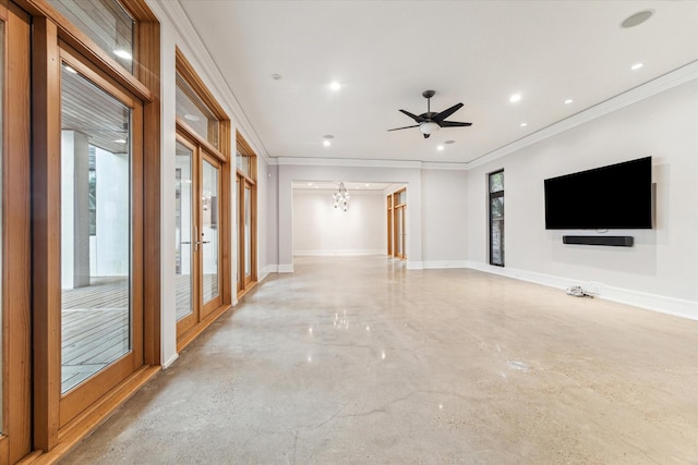 unfurnished living room featuring concrete floors, baseboards, and recessed lighting