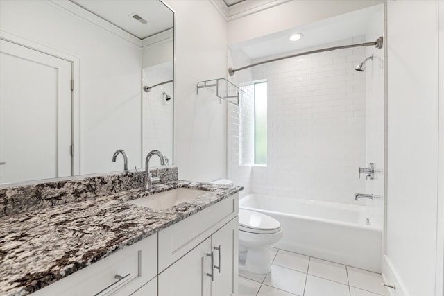 bathroom featuring toilet, visible vents, bathing tub / shower combination, vanity, and tile patterned floors