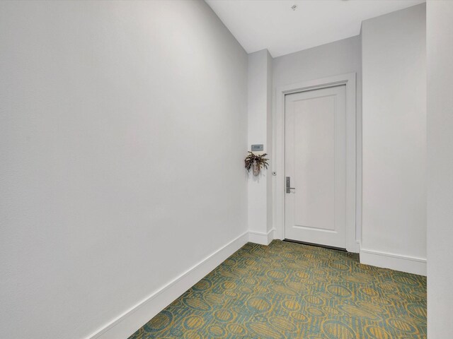 doorway with baseboards