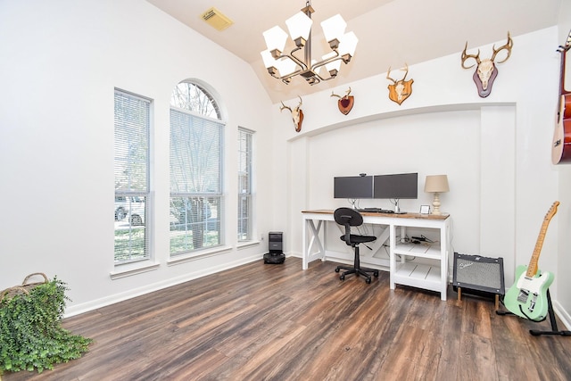 office featuring lofted ceiling, wood finished floors, visible vents, and baseboards