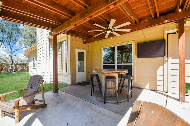 view of patio / terrace with outdoor dining space and ceiling fan