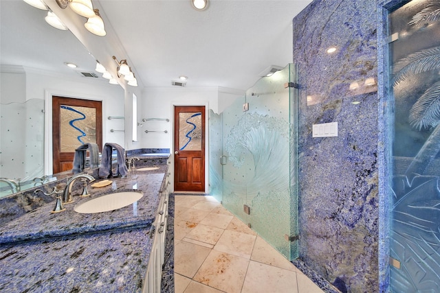 full bathroom with a stall shower, visible vents, and a sink