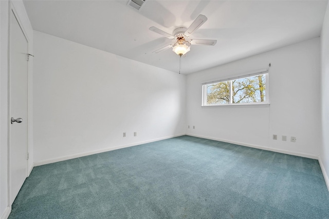 interior space with visible vents, baseboards, and a ceiling fan