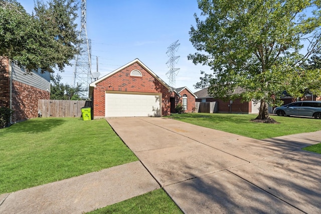 ranch-style house featuring brick siding, an attached garage, a front yard, fence, and driveway