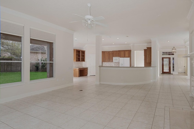 unfurnished living room featuring light tile patterned floors, ornamental molding, a ceiling fan, and baseboards