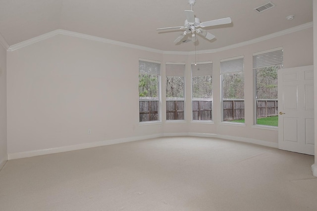 unfurnished room with light carpet, baseboards, visible vents, and ornamental molding