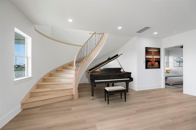 interior space with recessed lighting, visible vents, baseboards, and wood finished floors