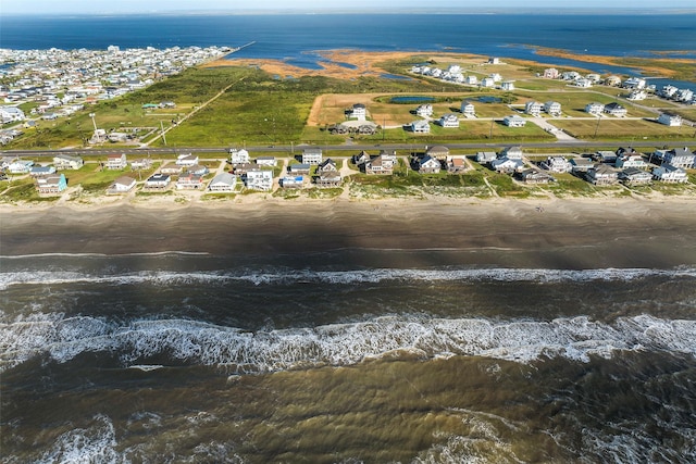 birds eye view of property with a water view and a residential view