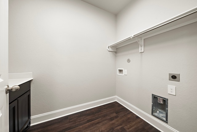 clothes washing area with hookup for a washing machine, baseboards, cabinet space, dark wood-style floors, and electric dryer hookup