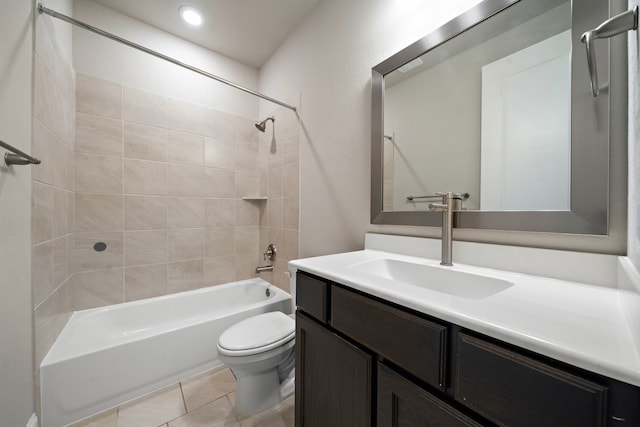 full bath with shower / washtub combination, vanity, toilet, and tile patterned floors