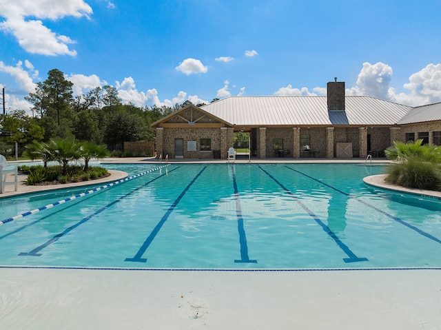 community pool with a patio