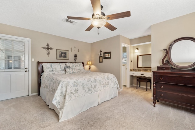 bedroom with light carpet, baseboards, and visible vents