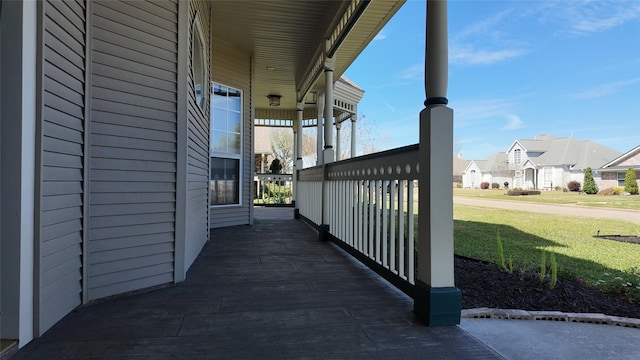 view of home's exterior featuring a residential view and a lawn