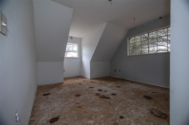 bonus room with vaulted ceiling