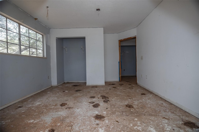 unfurnished bedroom with a closet