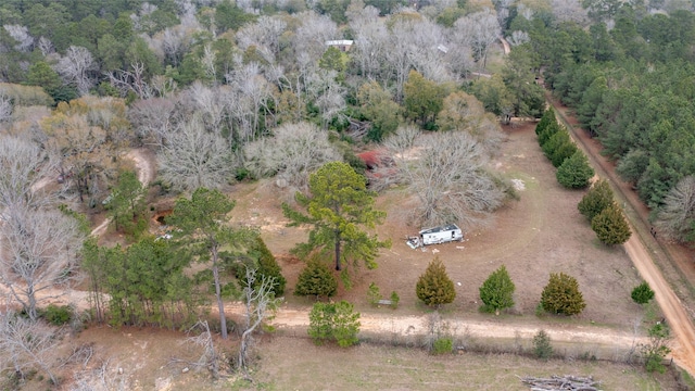 birds eye view of property with a rural view