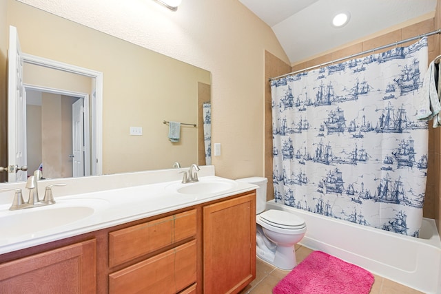 full bath with shower / bath combination with curtain, a sink, and tile patterned floors