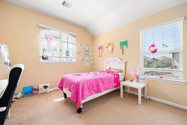 carpeted bedroom with lofted ceiling, visible vents, and baseboards