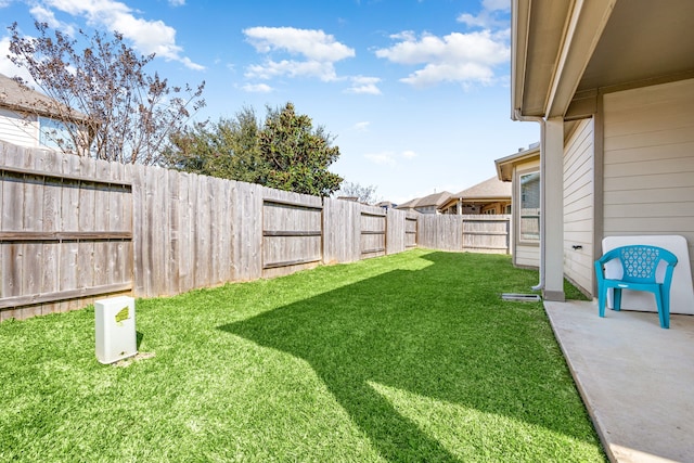 view of yard featuring a fenced backyard