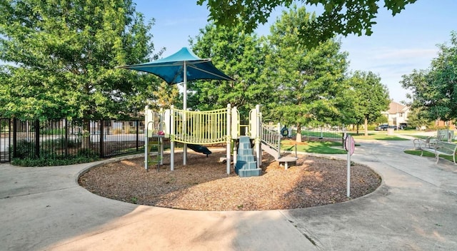 community play area featuring fence