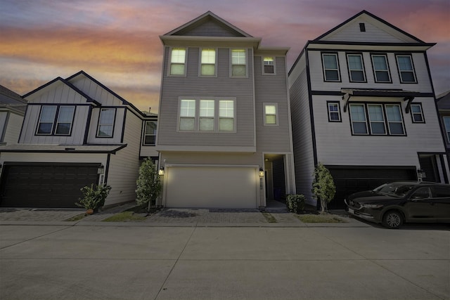 view of front of home featuring a garage and driveway