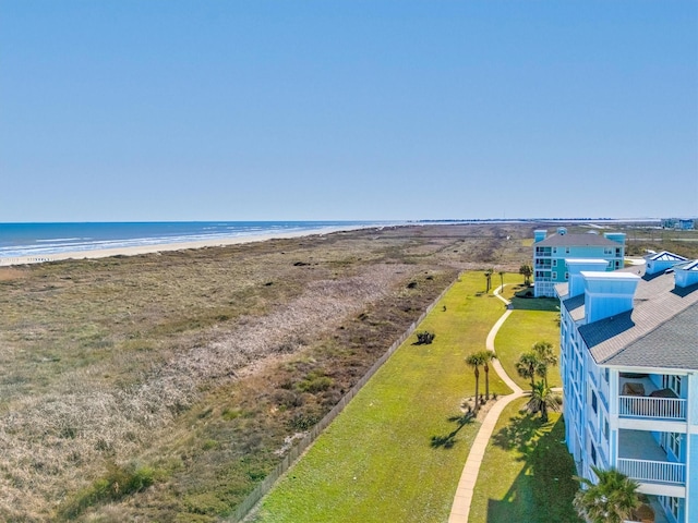 aerial view featuring a water view and a beach view