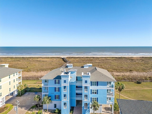 bird's eye view with a view of the beach and a water view