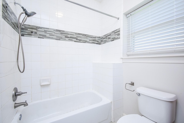 bathroom with shower / tub combination and toilet