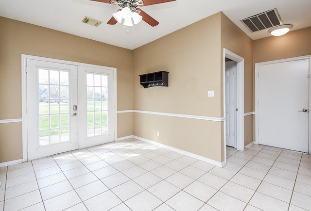 doorway to outside featuring baseboards, french doors, visible vents, and a ceiling fan