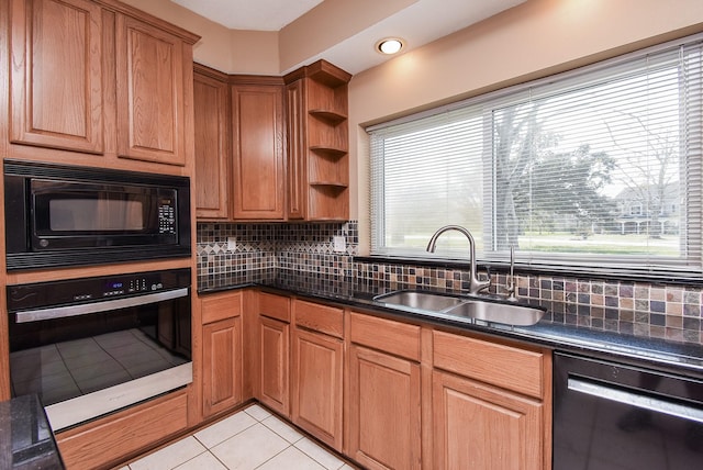 kitchen featuring light tile patterned floors, open shelves, backsplash, a sink, and black appliances