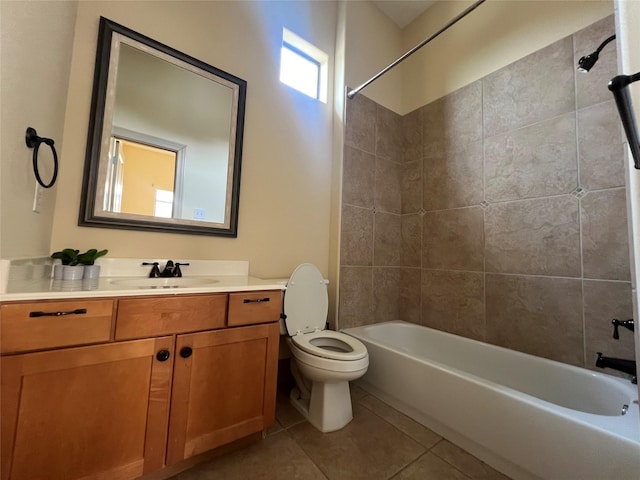 full bathroom featuring tile patterned flooring, tub / shower combination, vanity, and toilet