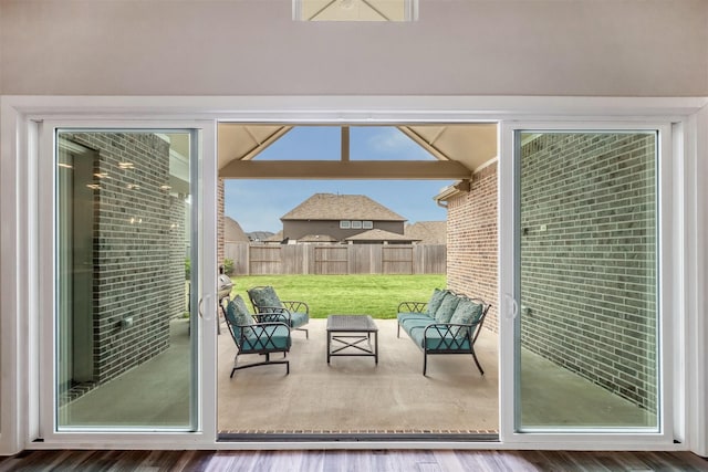 entryway with wood finished floors