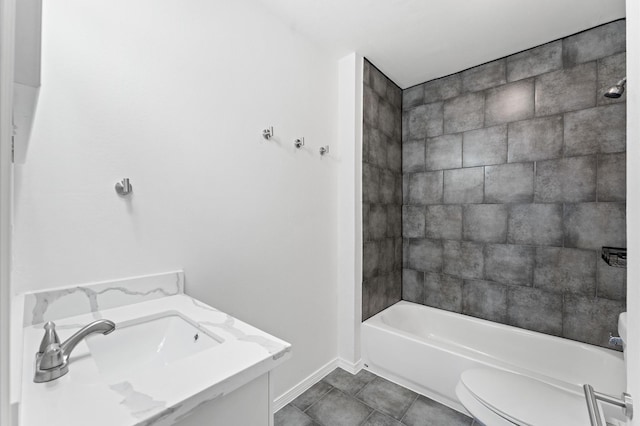 full bath with tile patterned flooring, baseboards, toilet, and tub / shower combination